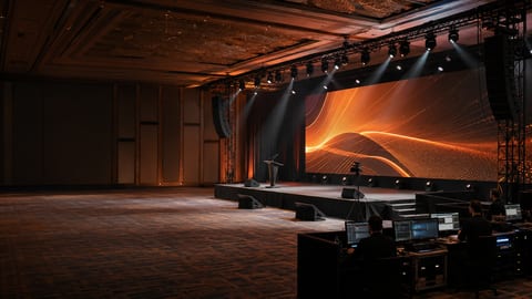Professional AV event production with stage lighting